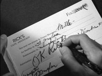 Fig. 2. In Casablanca (1942) we see Rick signing a check before we see his face.