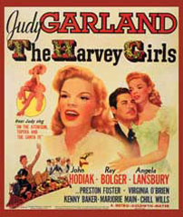 Judy Garland i George Sidneys The Harvey Girls (1946). Posteren betoner stjernen og giver dermed indirekte indtryk af genren. Et indtryk som justeres med et mindre indsat foto af Angela Lansbury klædt som en saloon-pige. Modsat kvalitetsfilmen markedsføres musicals og komedier oftest på spectacle og den rene visuelle lyst.