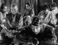 Fig. 3. Kikuchiyo (Toshirô Mifune) broods before condemning the flaws of peasants and samurai alike.