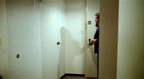 Fig. 5: The Player’s apartment is consonant with the film’s stark design program.