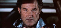 Fig. 5: Kurt Russell bag rettet i Death Proof, der også omhandler en stuntkører, er nok den nærmeste slægtning til Drive blandt Tarantinos film, som selvfølgelig også har retroæstetik og Leone-inspiration til fælles med Drive.