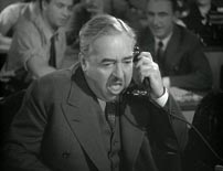 Fig. 5. Walter Connolly er glimrende som Arthur McArthur – Chris’ koleriske chef: ”Hunter wouldn’t leave the camera if his grandmother was on fire”.