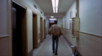 Fig. 5. Travis enters the hallway and walks away from the camera towards the NYC street in the background. Photo: Columbia TriStar Home Video.