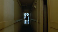 Figs. 6-7: The undecorated surfaces and simplified color-scheme continue in The Driver’s apartment and hallway.