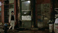 Fig. 4-7. After Hours. As the van pulls away to the right, the camera pans left and Paul appears on the left side of the screen.