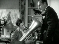 Fig. 7: Gary Cooper som Longfellow Deeds og Douglass Dumbrille som advokaten John Cedar i “Mr. Deeds...”