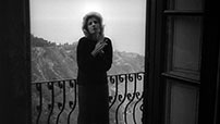 Fig. 7: Claudia on the porch outside the hotel room in Taormina.