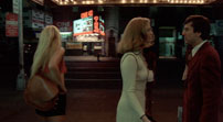 Fig. 9. ”Taking me to a place like this is about as exciting to me as saying, ’Let’s fuck’.” Note the working girl to the left of Betsy. Photo: Columbia TriStar Home Video.