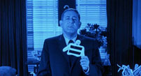Fig. 9. 13 Ghosts: Castle demonstrates the ghost viewer. One of the film’s taglines was “You’ll believe in ghosts too when you see them through the new ‘ghost viewer.’ Free to everyone who sees this movie.” (Castle 1992, p. 162). Just in case we hadn’t gotten the message that William Castle is the author of 13 Ghosts, Castle himself returns in an epilogue to confirm that fact.