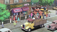 Fig. 13: Når Miyazaki vælger at genbruge dele af virkelige byer (i dette framegrab tydeligt en skandinavisk storby i 1960erne; Miyazaki har selv udpeget Stockholm som den store inspirationskilde) i sine detaljerede baggrunde, giver det Kiki en ekstra følelse af noget genkendeligt, som man har lyst til at gå på opdagelse i. Det nostalgiske design sætter fantasien igang og udvider derved filmens rum.