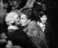 Fig. 15. Shortly after, Chico makes his way through the Parisian crowd celebrating the armistice.