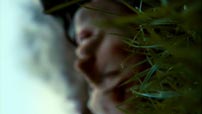 Fig. 11. Cloverfield (2008). Camera lying in the grass next to Hud.