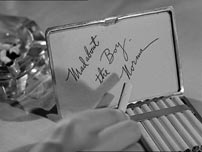 Fig. 13-14. Mad about the Boy er endnu en reference til Sunset Boulevard. Toni Mannix’ inskription på uret til george er identisk med inskriptionen på cigaretetuiet som Norma giver Joe i Sunset Boulevard.